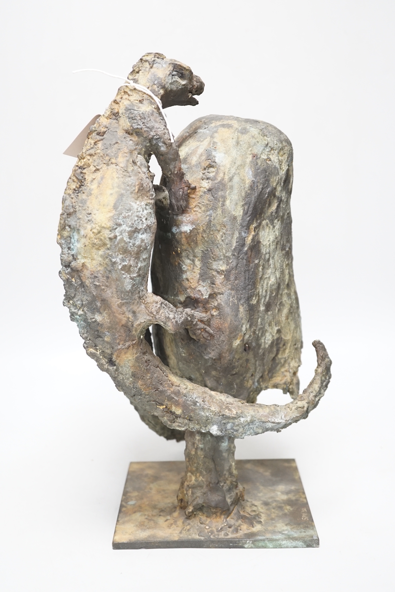 A patinated bronze of two lizards scaling a rock, raised on a square base, monogrammed SMV and dated 1992 to the base, 40cm high